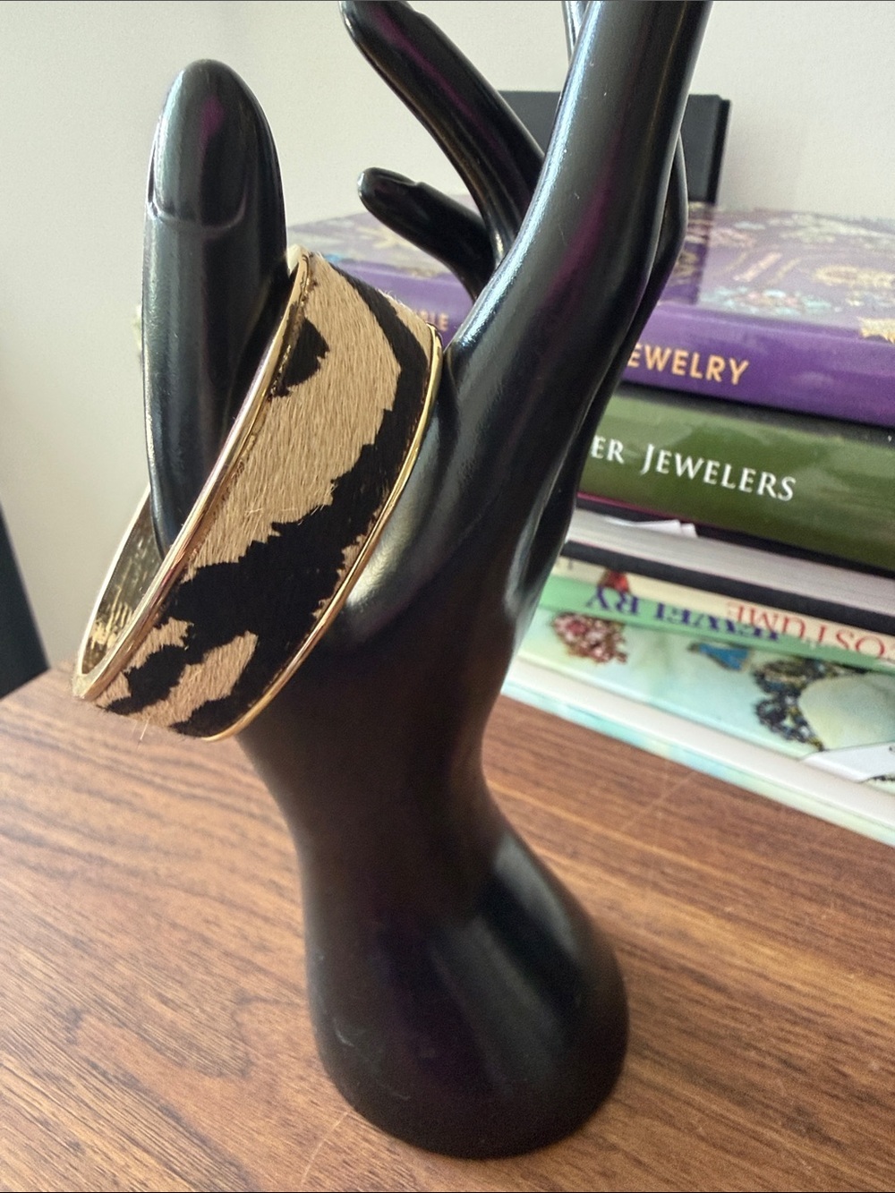 Bangle Bracelet w/Faux Zebra Printed Hide Set in a Gold Tone Elliptical Frame. - Picture 2 of 6